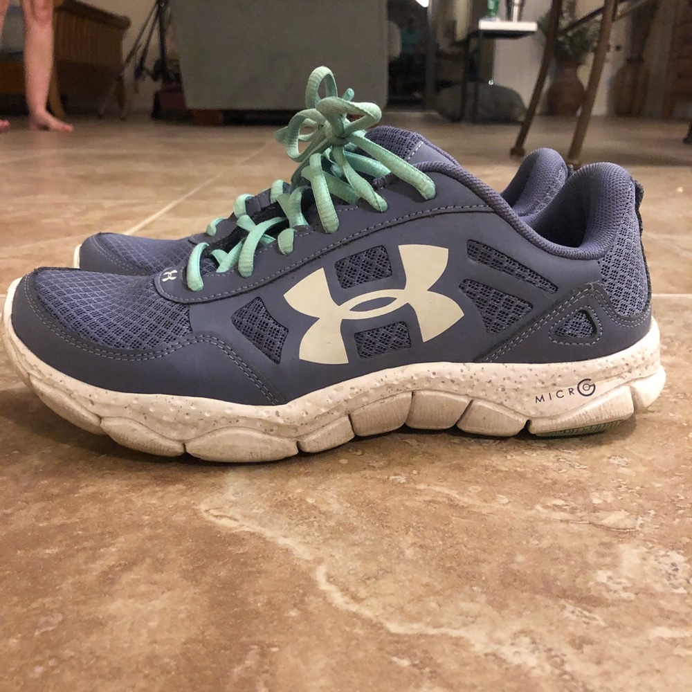 Under armor tennis shoes. Color is  a purple/gray